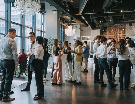 Guests mingling at a Skeleton Key gathering